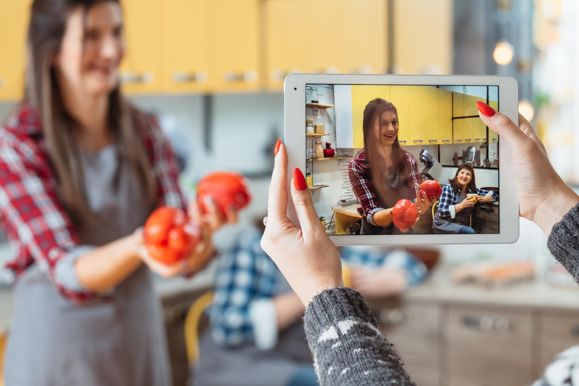 Instructor on video call demonstrating a recipe
